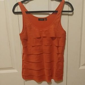 Sleeveless, ruffle blouse
